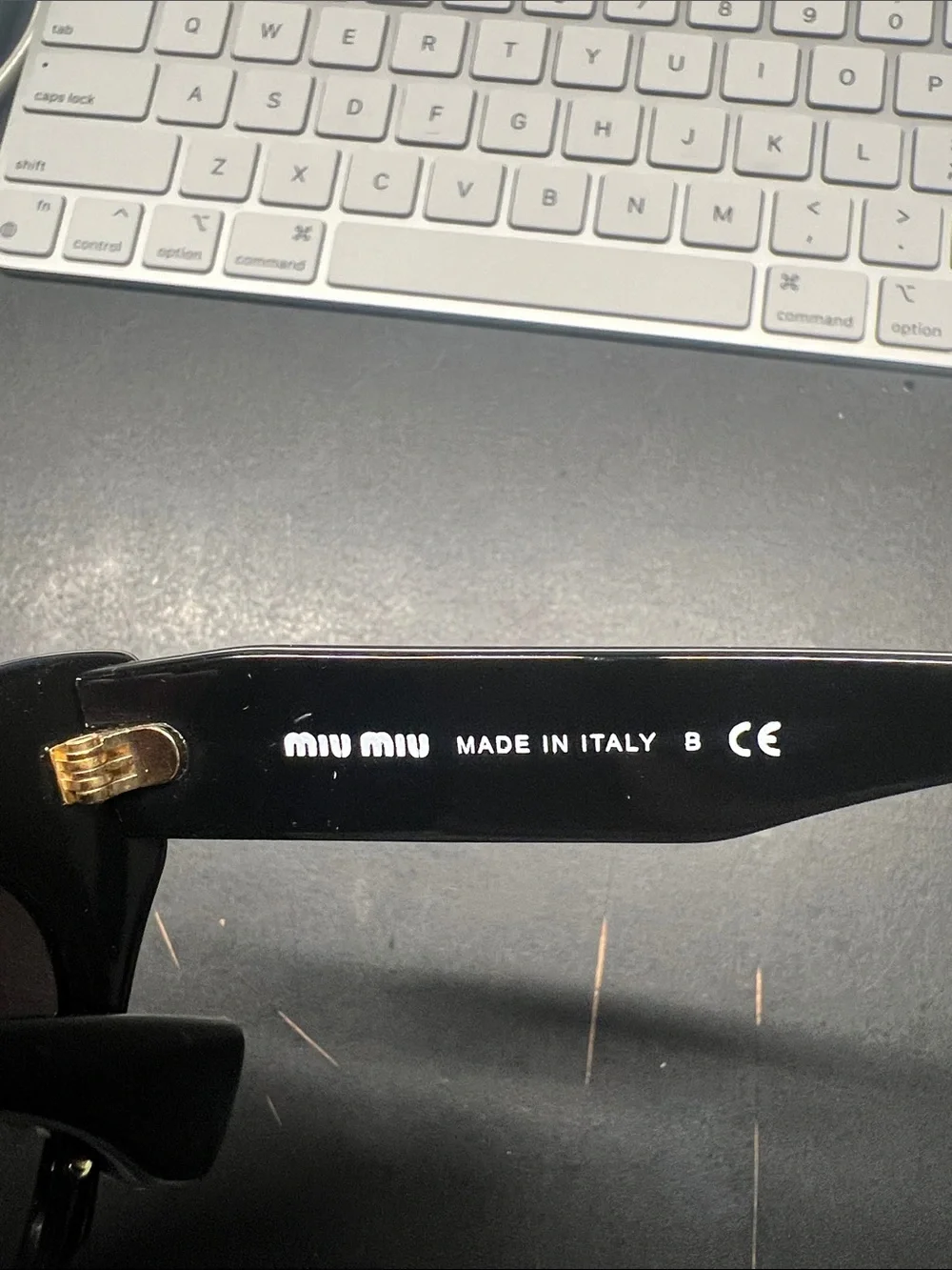 Miu Miu Black Cat-Eye Sunglasses with Gradient Lenses